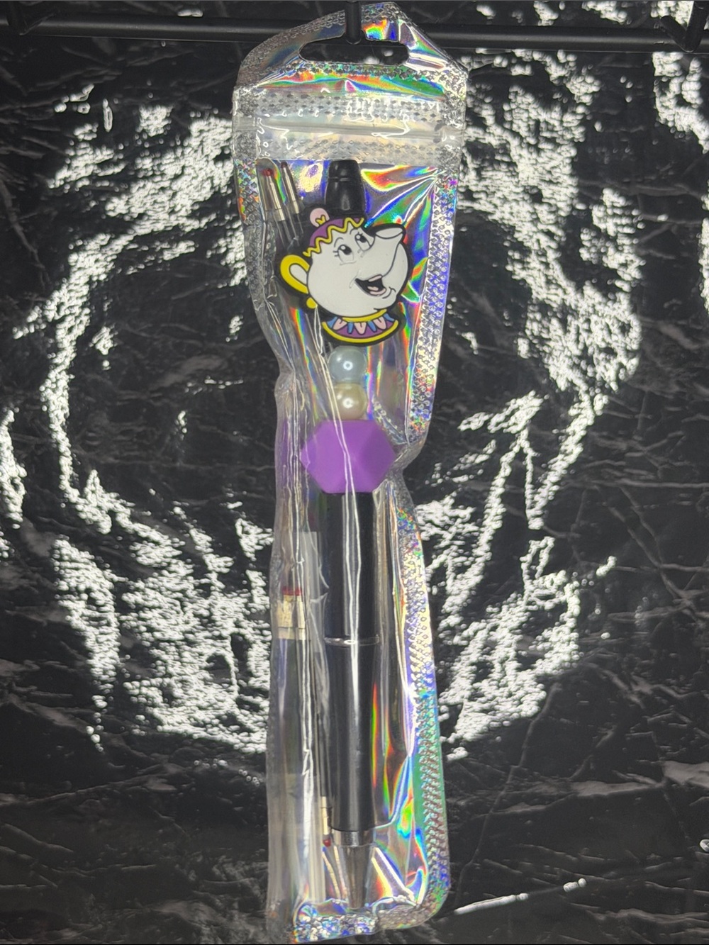 Mrs. Potts from beauty and the beast focal bead pen
Black and blue ink